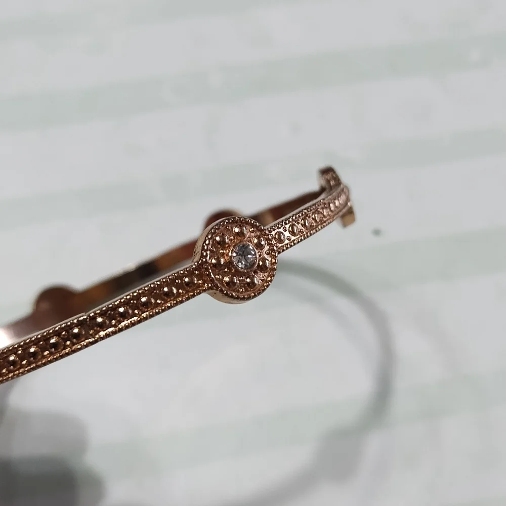 Gold-Tone Metal Women's Bangle Bracelet with Crystal Rhinestone Accents